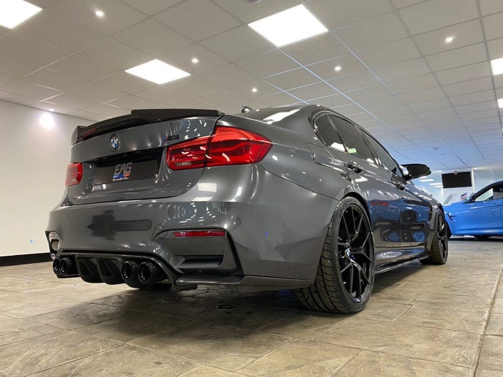 BMW M3 F80 full carbon fibre kit by CT Carbon, including splitter and body parts, showcasing a sleek, lightweight carbon fibre finish.