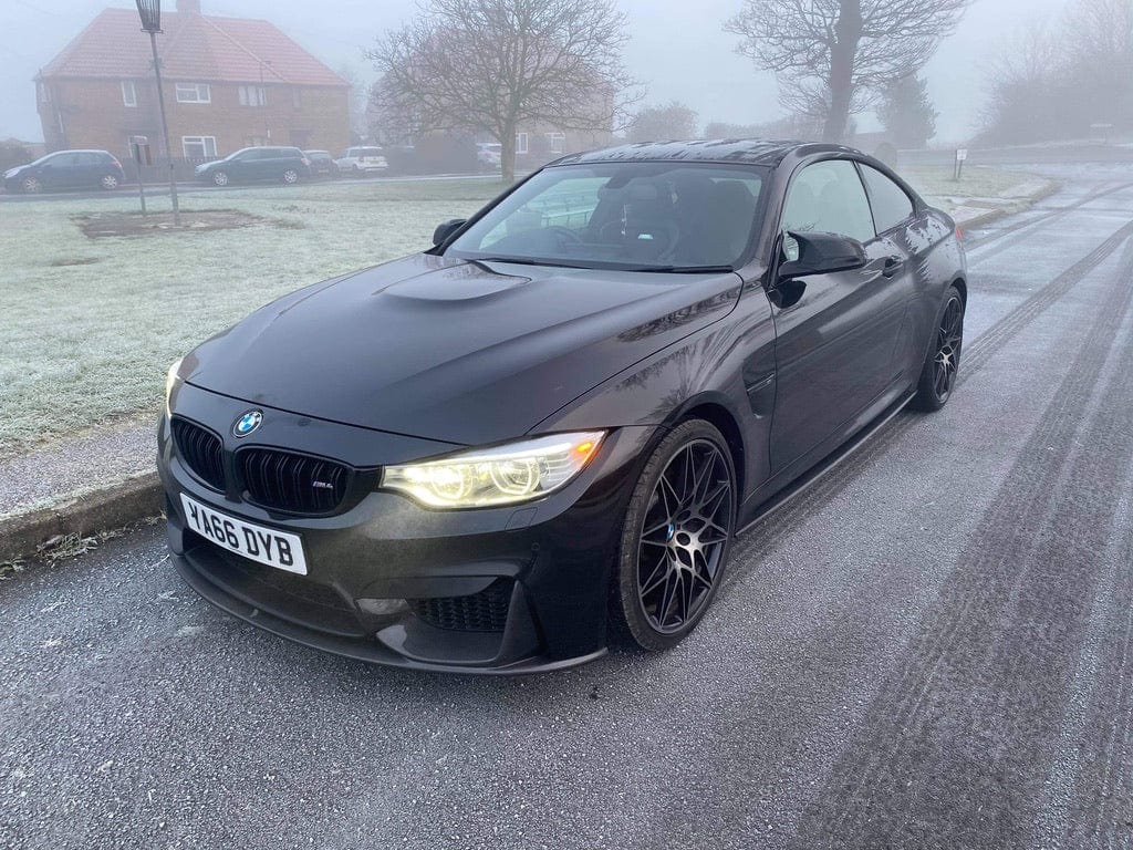 Full BMW M3 F80 carbon fibre kit by CT Carbon, including splitter and body panels, showcasing sleek, lightweight carbon fibre components.