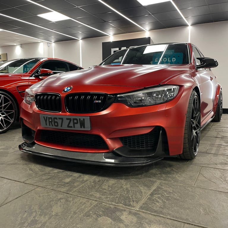 Carbon fibre splitter for BMW M3 M4 F80 F82 F83 by CT Carbon, GTS style, two-piece design, enhances aerodynamics and sporty look.