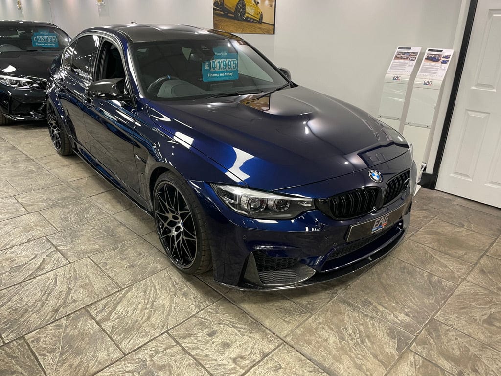 Full BMW F82 M4 Coupe 2014-2020 CT Carbon full carbon fibre kit with splitters, shown on the car's front and side view.