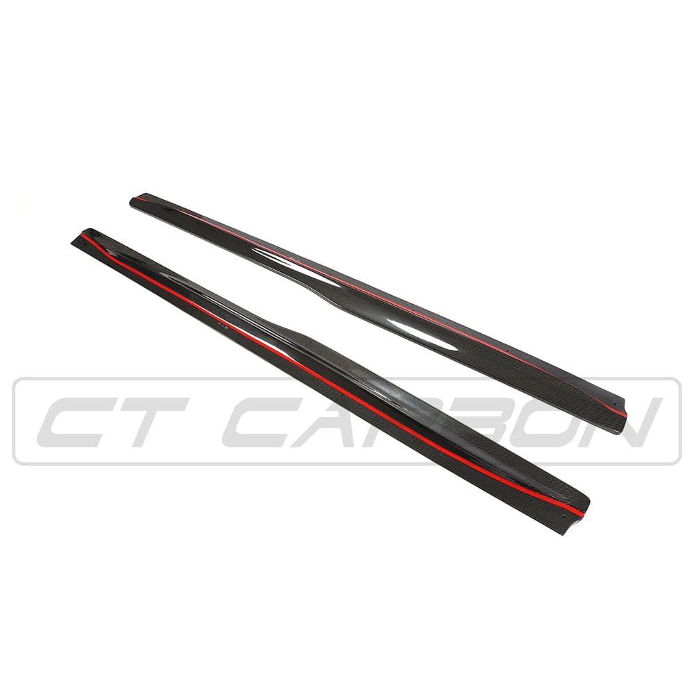 BMW M4 F82 F83 carbon fibre side skirts by CT Carbon, featuring sleek PS style design, installed on the vehicle's sides.
