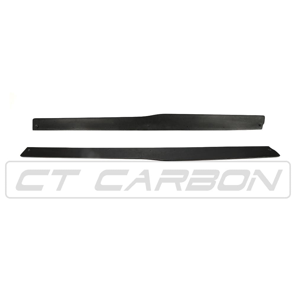 BMW M4 F82 F83 carbon fibre side skirts by CT Carbon, featuring PS Style design, installed on the vehicle's side panels.