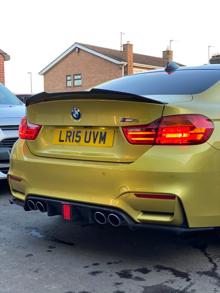 BMW M4 F83 convertible full carbon fibre kit by CT Carbon, including splitter and aerodynamic components on the car.
