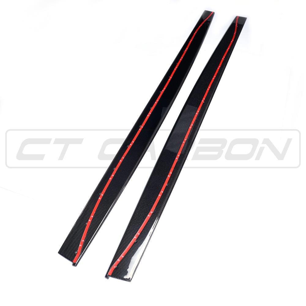 BMW M4 F83 convertible full carbon fibre kit by CT Carbon, showing the splitter and aerodynamic components on the car.