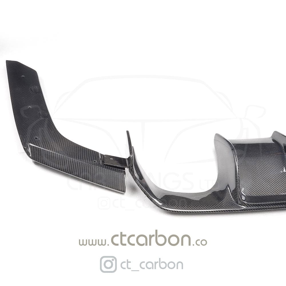 BMW M4 F83 convertible full carbon fiber kit by CT Carbon, featuring V-style splitter and aerodynamic enhancements.