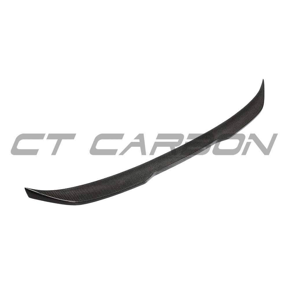 Carbon fibre kit for BMW G30 5 Series 2016-2023, including splitter and spoiler, by CT Carbon for enhanced sporty style.