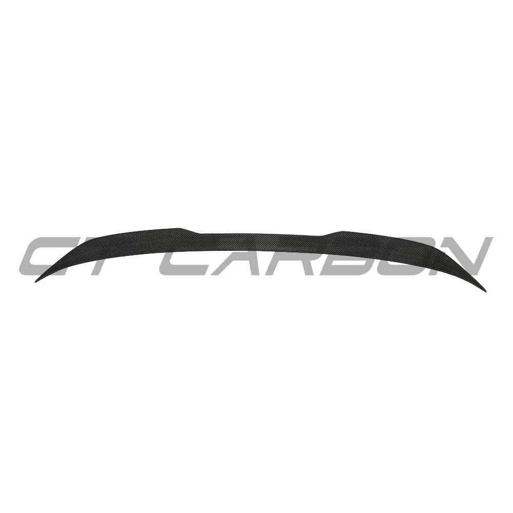 BMW M5 F90 and G30 5 Series carbon fibre spoiler by CT Carbon, showcasing sleek aerodynamic design and textured carbon finish.