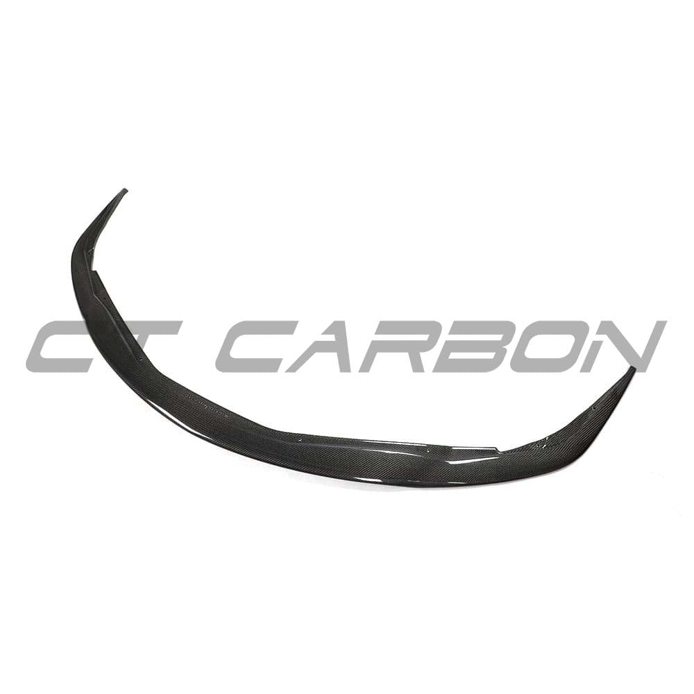 Toyota Supra 2019+ A90 CT Carbon full carbon fibre kit including front splitter and side skirts, showcasing sleek carbon fiber details.