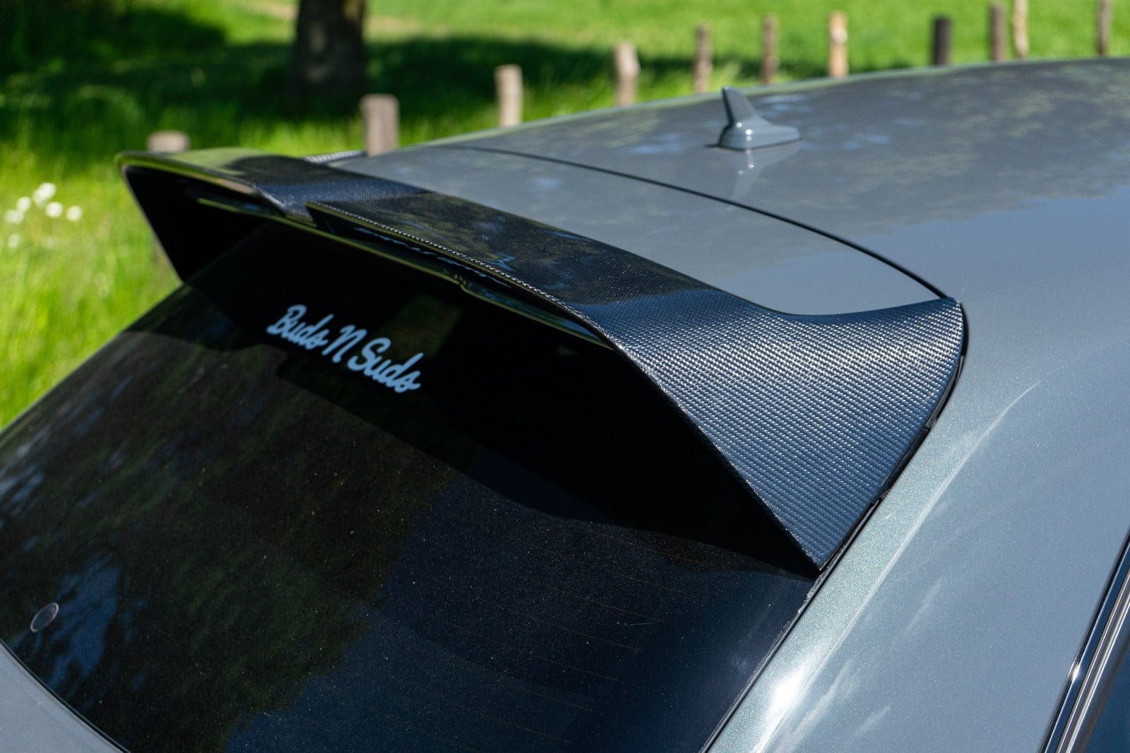 CT Carbon Audi A3 S-Line & S3 Sportback 8V carbon fibre spoiler showing sleek aerodynamic design on hatchback model.