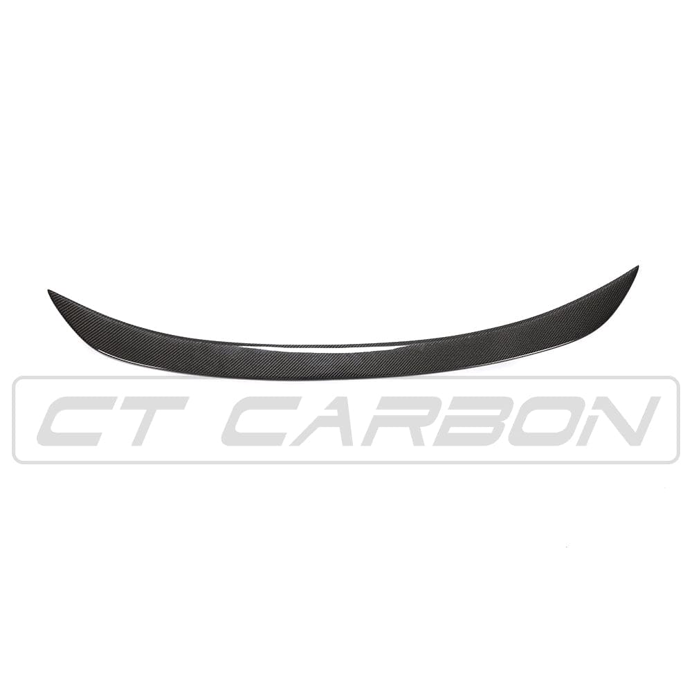BMW F10 M5 and 5 Series carbon fiber spoiler by CT Carbon, showcasing sleek V-style design and high-quality lightweight material.