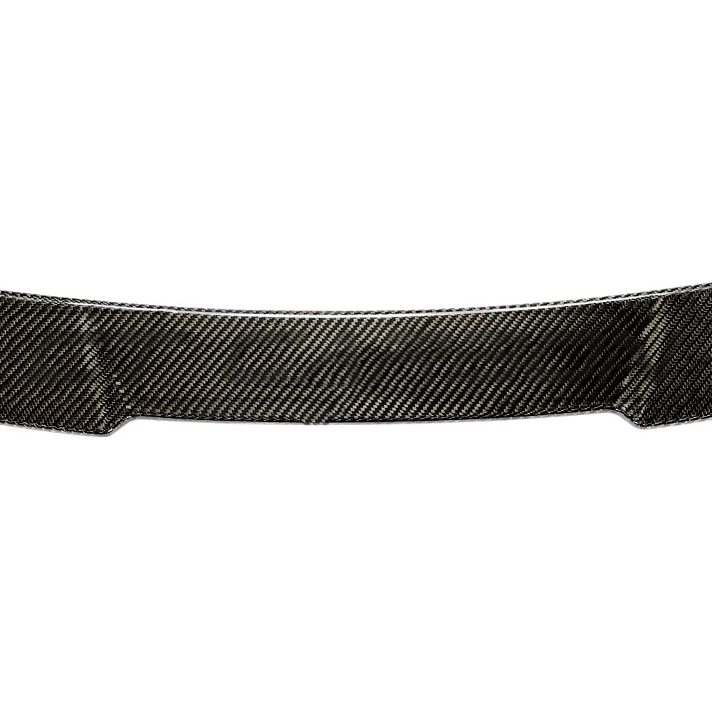 BMW G83 M4 full carbon fibre kit by CT Carbon, featuring a sleek carbon fibre spoiler on a sporty V8 M4.