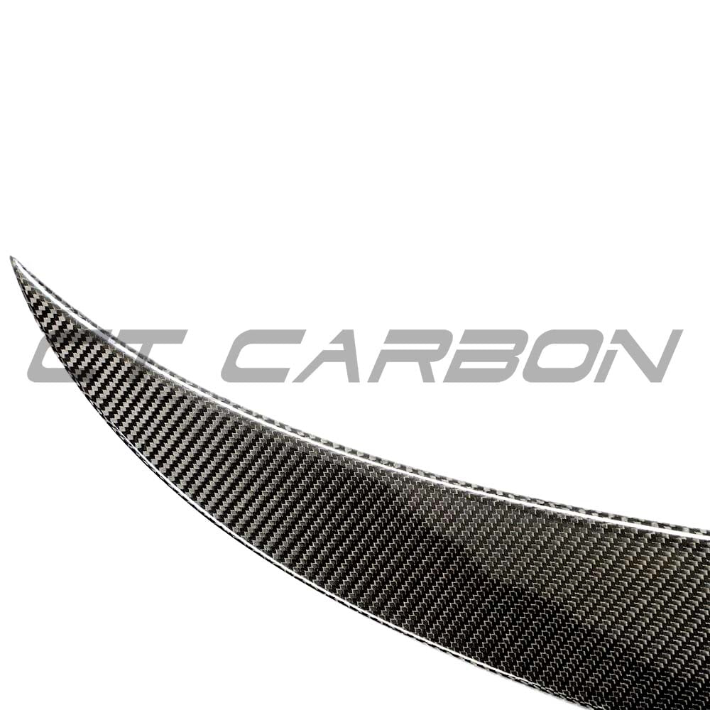 BMW G83 M4 full carbon fibre kit by CT Carbon, featuring a sleek carbon fibre spoiler on the BMW M4 G83 4 Series.
