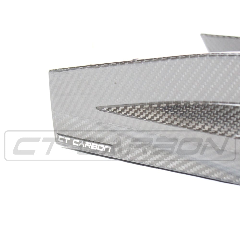 BMW M4 G82/G83 carbon fibre rear bumper corners by CT Carbon, OEM-style accessories for enhanced vehicle performance.