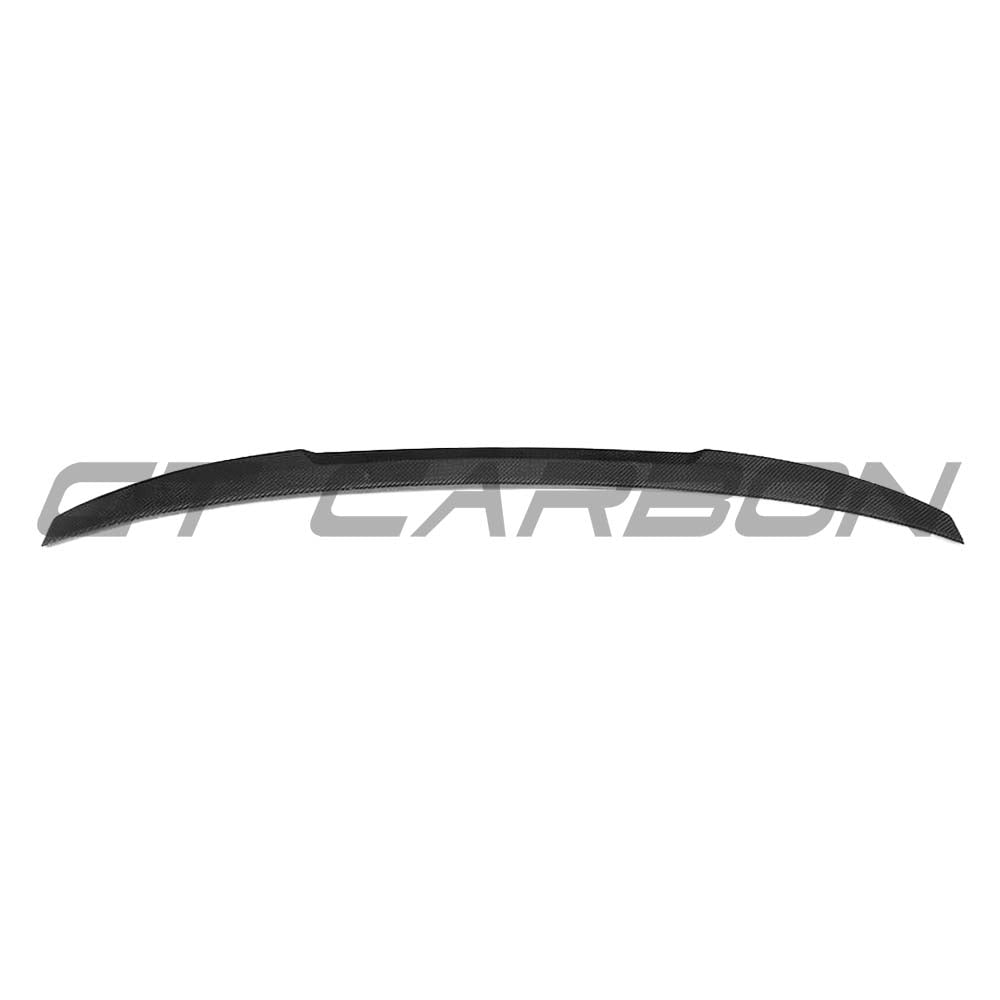 BMW G30 5 Series carbon fibre kit by CT Carbon, featuring a M4-style spoiler and sleek carbon fibre accents.