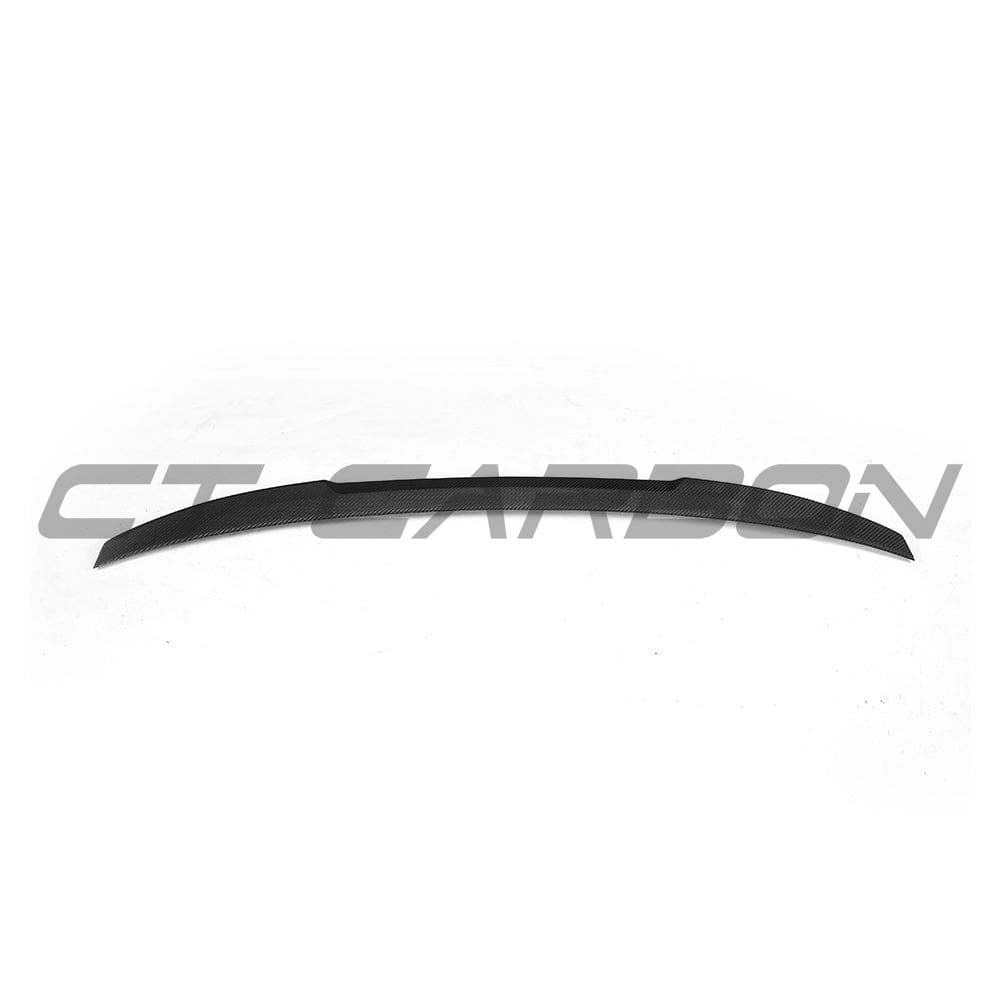 BMW G30 5 Series 2016-2023 carbon fibre kit with M4-style spoiler by CT Carbon, showcasing sleek black carbon fibre detailing.