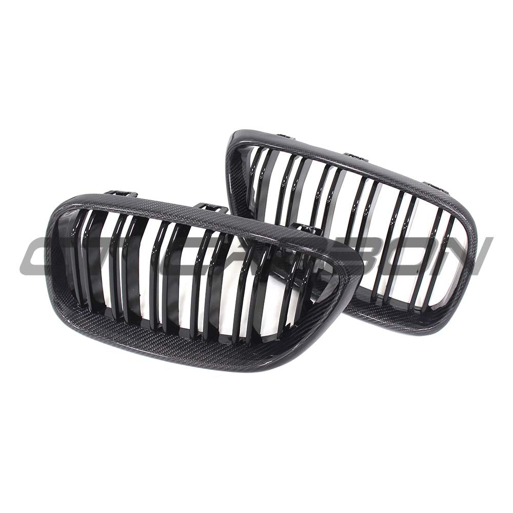 BMW M2 and 2 Series F87/F22 carbon fiber grille by CT Carbon, showcasing sleek black carbon fiber design and detailed mesh pattern.
