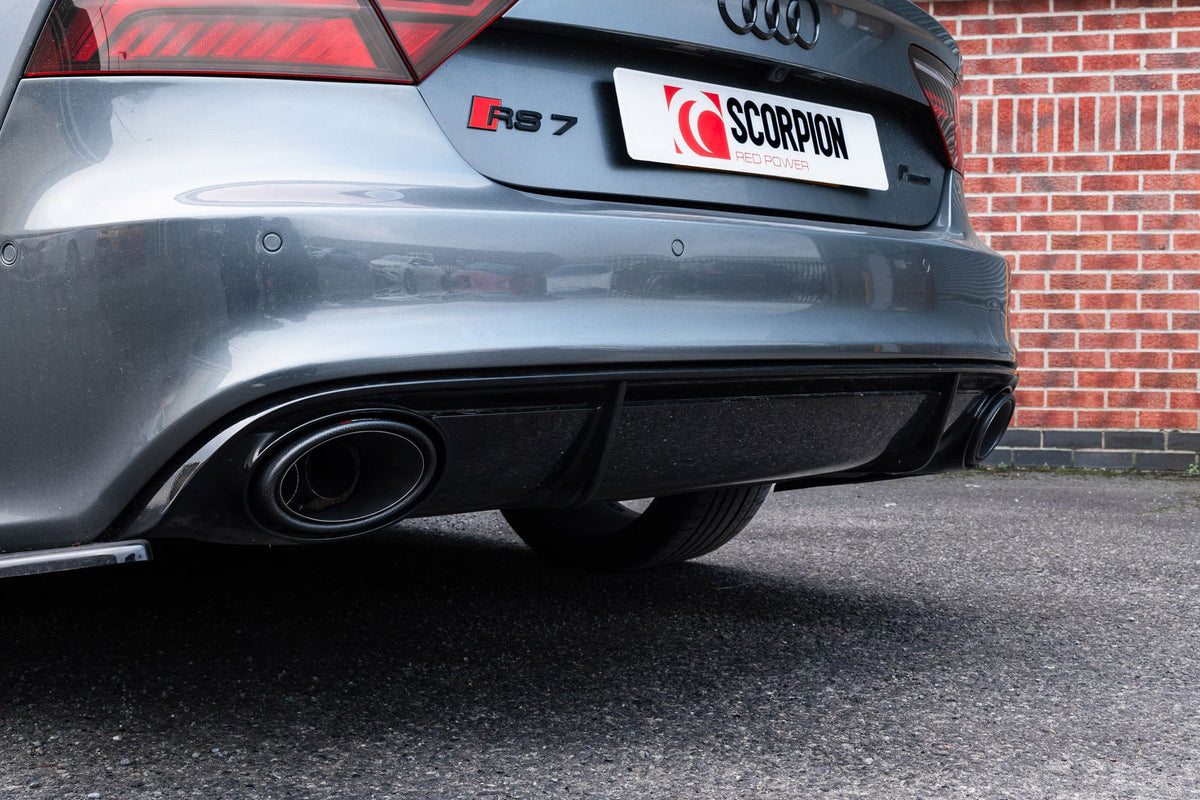 Scorpion Exhausts Audi RS7 C7 tailpipe trim with non-resonated half system and decorative trims, showcasing the polished metal finish.