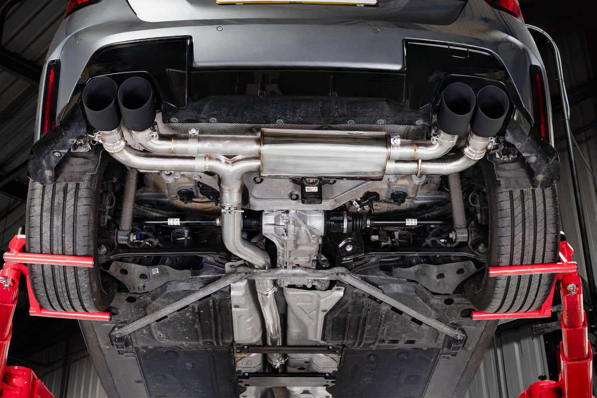 Scorpion BMW F70 M135i GPF-Back Exhaust System with polished stainless steel pipes and dual exhaust tips visible in the image.