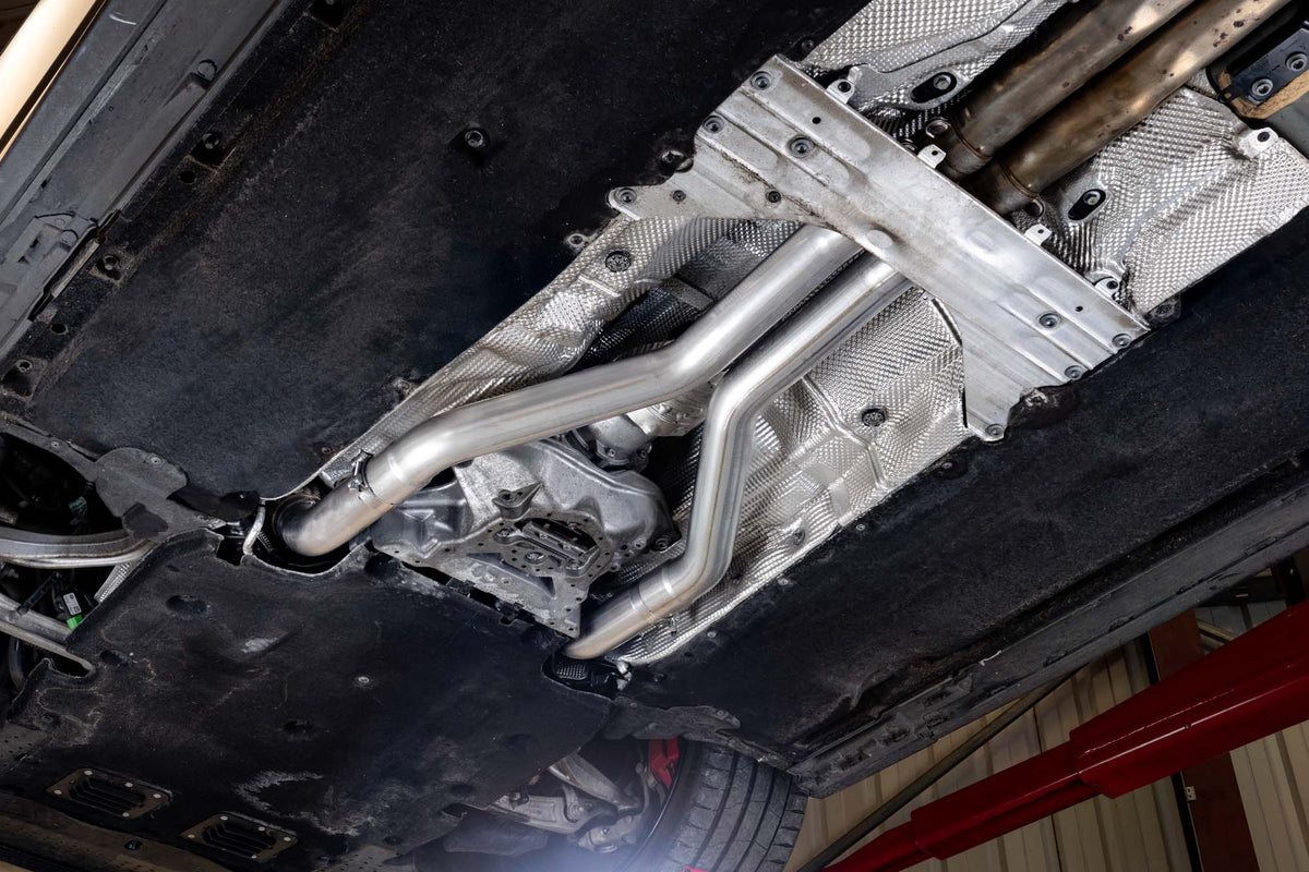Scorpion Audi RS6 C8 and RS7 C8 front exhaust pipes, showcasing the polished metal front section with connecting pipes.