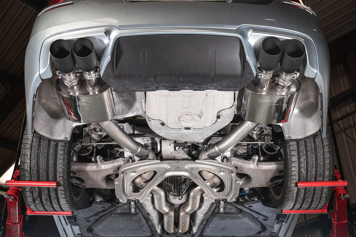 Scorpion BMW M5 F10 rear silencer in polished metal, designed for optimal exhaust sound and performance.