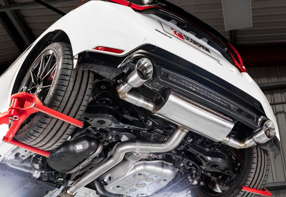 Scorpion Toyota Yaris GR Gen 2 GPF-Back Exhaust System showing stainless steel pipes and exhaust tips in a workshop setting.
