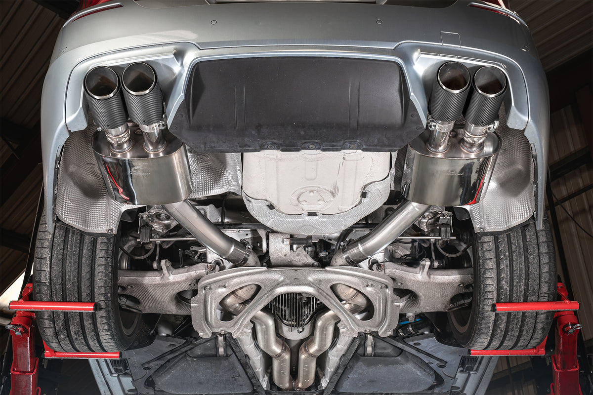 Scorpion BMW M5 F10 rear silencer exhaust system, featuring polished metal finish and dual exhaust outlets.