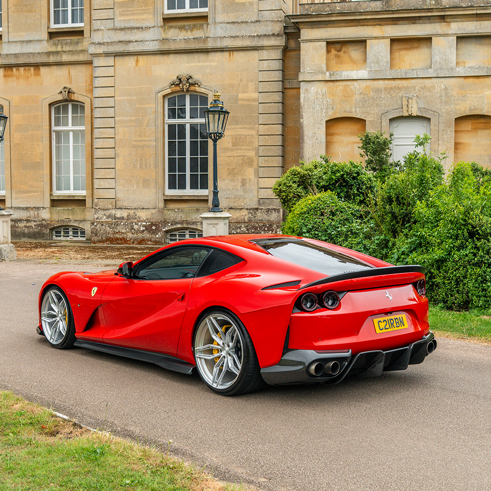 Carbon fibre spoiler for Ferrari 812 Superfast by CT Carbon, showcasing sleek aerodynamic design and lightweight construction.