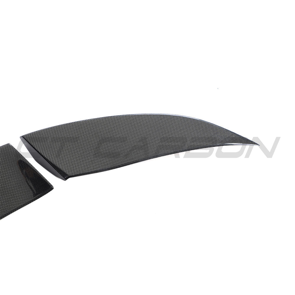 Ferrari 812 Superfast carbon fibre spoiler by CT Carbon, close-up view showing sleek aerodynamic design and glossy finish.
