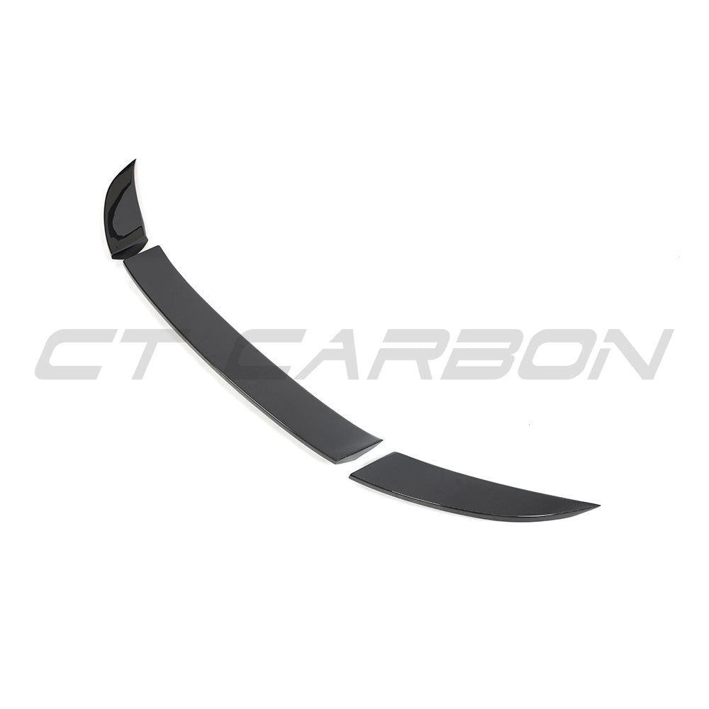 Ferrari 812 Superfast carbon fibre spoiler by CT Carbon, shown installed on the car with a sleek, aerodynamic design.