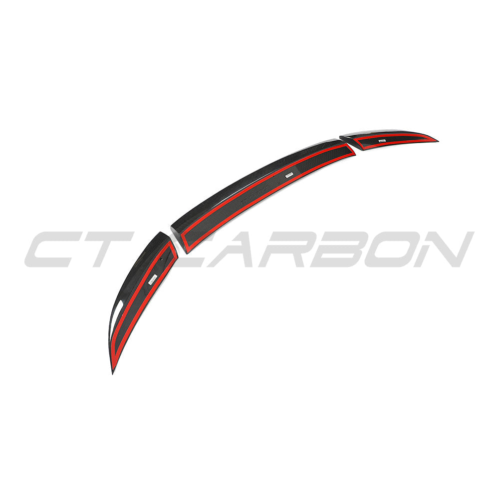 Ferrari 812 Superfast carbon fiber spoiler by CT Design, showcasing sleek aerodynamic design and detailed carbon fiber texture.
