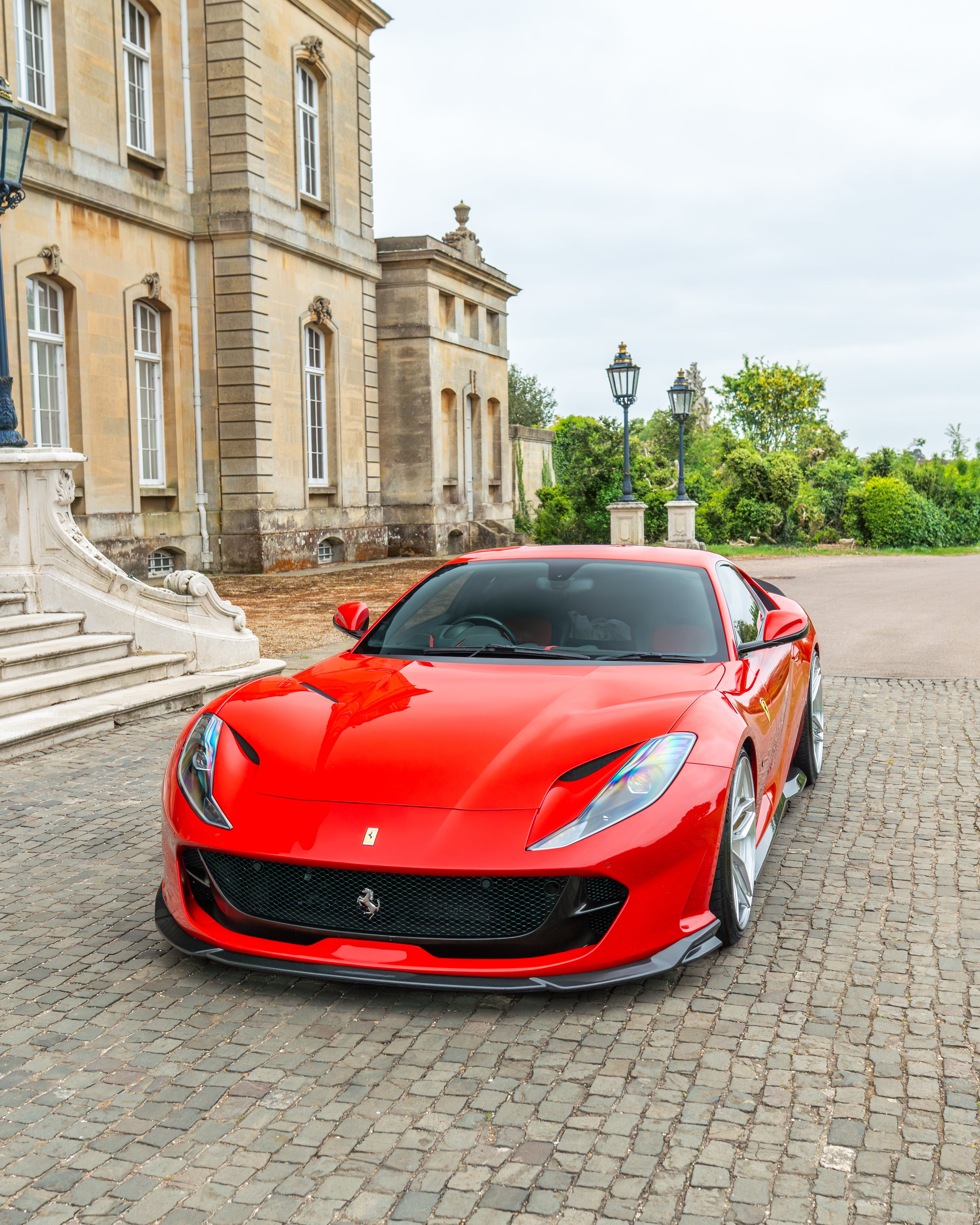 Ferrari 812 Superfast carbon fibre splitter kit by CT Design, showcasing lightweight, high-performance carbon fibre parts.