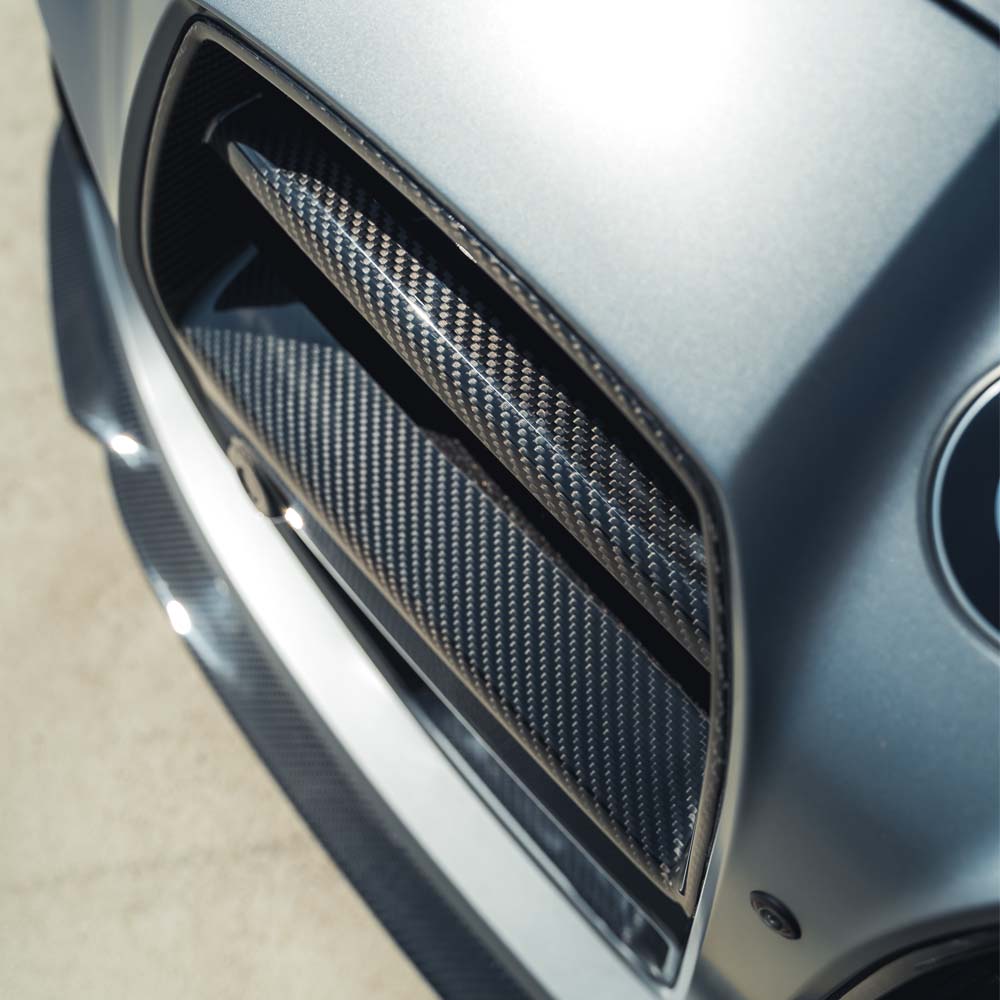 BMW G81 M3 Touring full carbon fibre kit by CT Carbon, showing detailed close-up of carbon fiber components and finish.