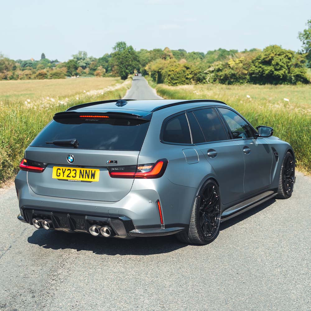 BMW G81 M3 Touring full carbon fiber kit by CT Carbon, showing detailed carbon fiber components and sleek design.