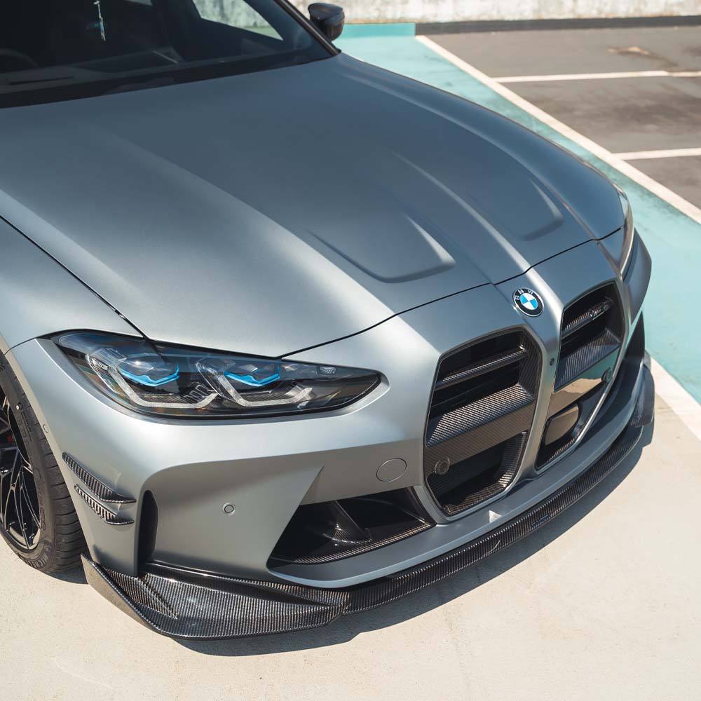 BMW G81 M3 Touring full carbon fiber kit by CT Carbon, showing detailed panels and aerodynamic components on the car.