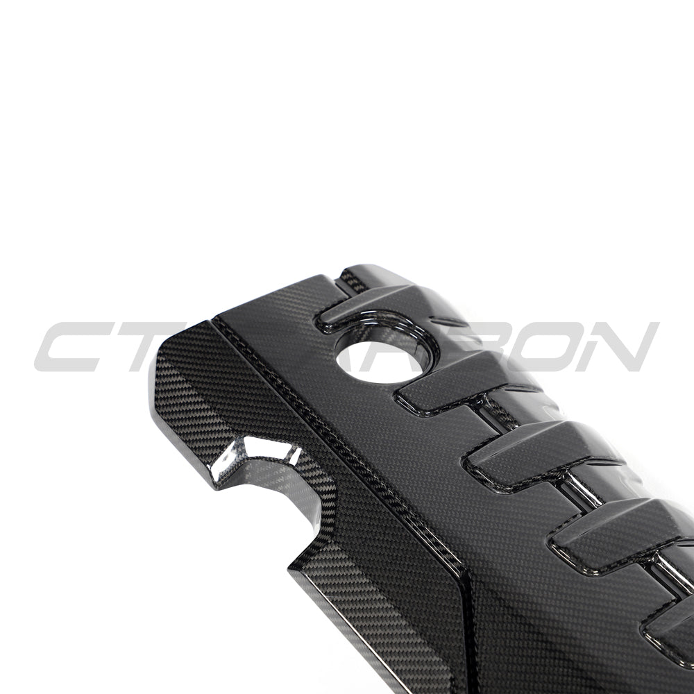 CT Carbon Audi RS3 8Y 2020+ carbon fibre engine cover accessory showing sleek, textured carbon fibre surface on engine bay.