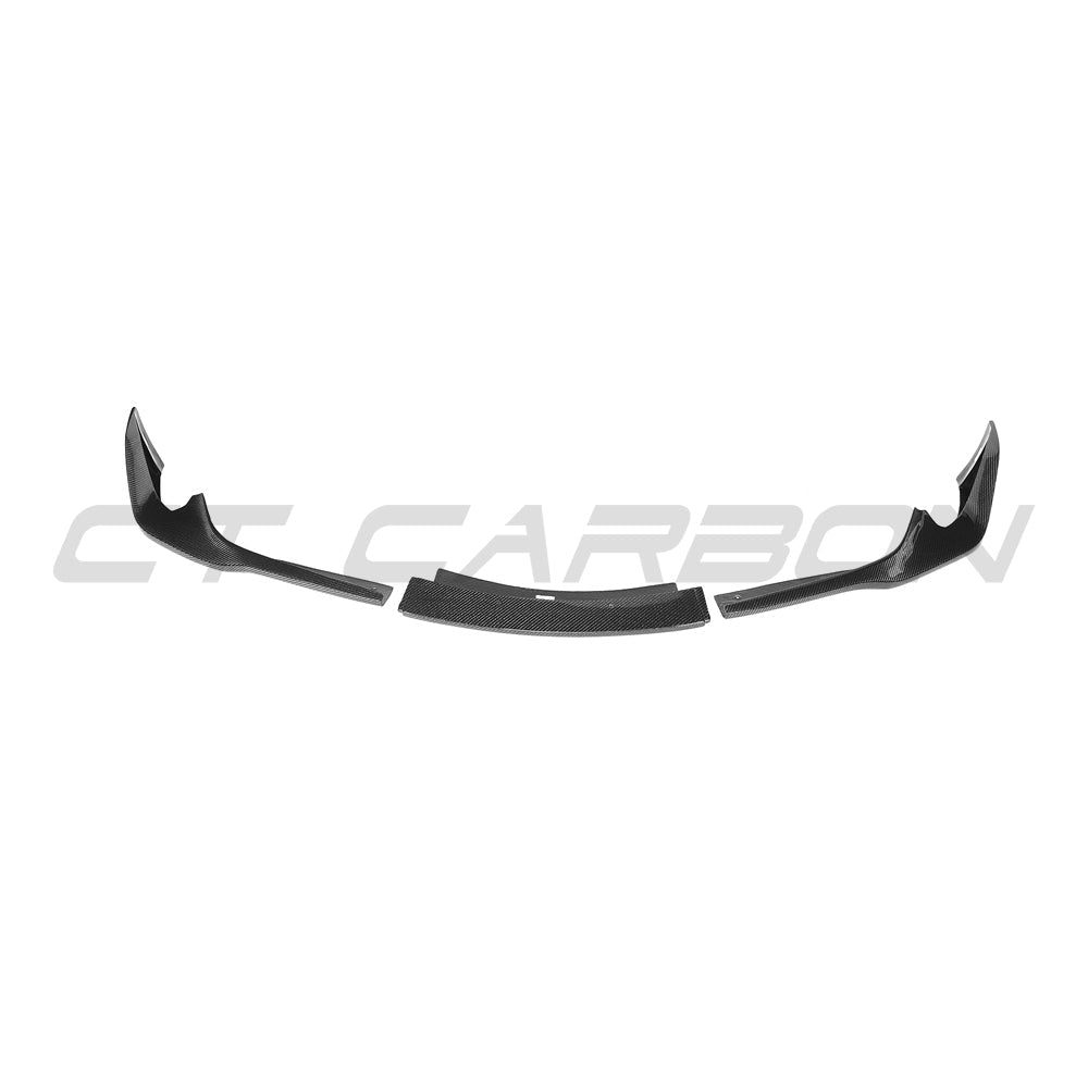 Toyota Supra 2019+ A90 carbon fiber splitter by CT Carbon, showing the sleek, aerodynamic design and textured carbon fiber surface.