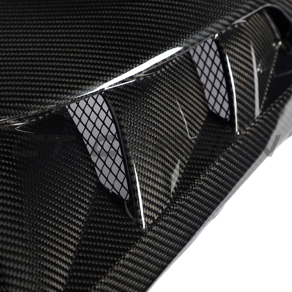 BMW G87 M2 full carbon fibre front end kit by CT Carbon, showcasing lightweight, aerodynamic front bumper and splitter details.