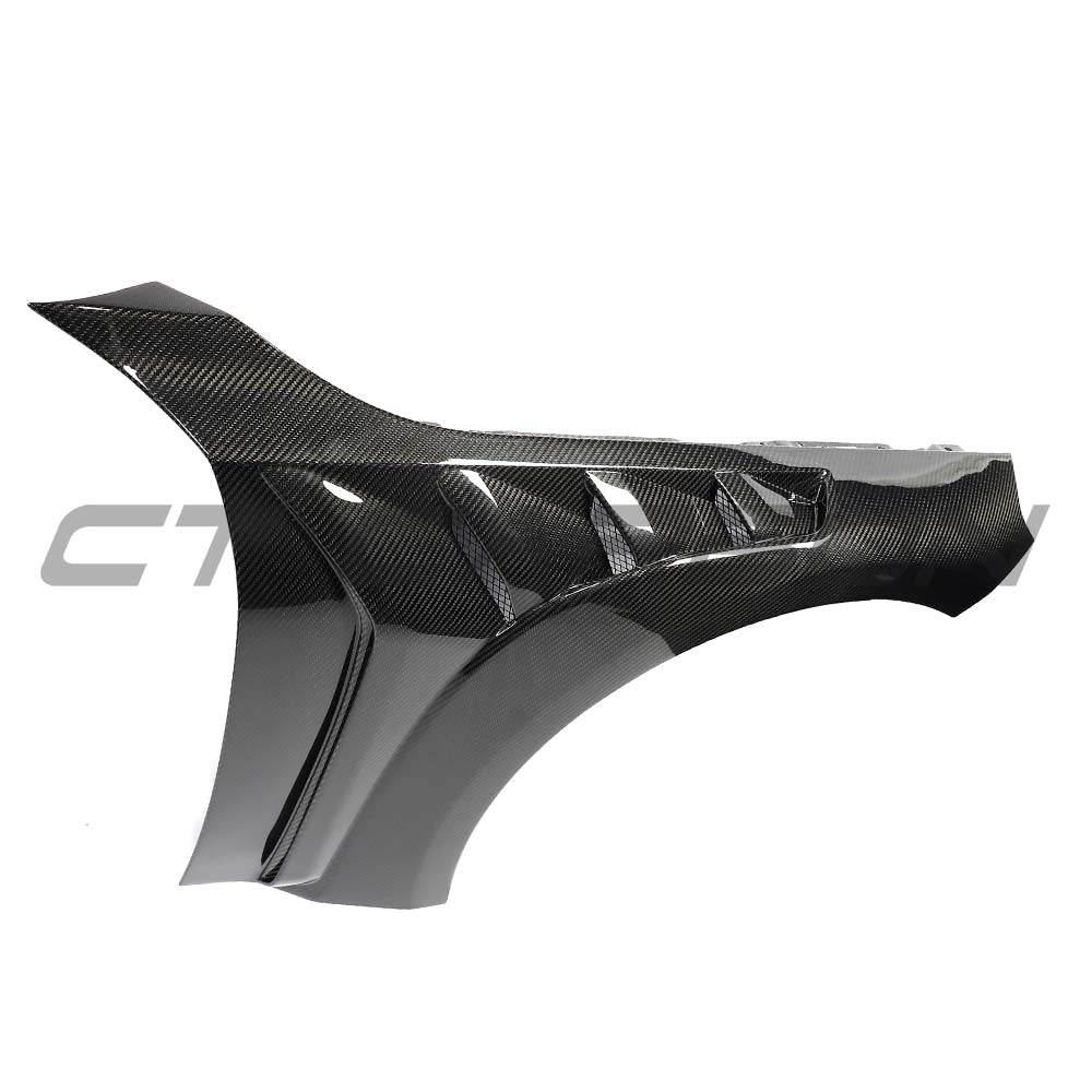 BMW G87 M2 CT Carbon full car carbon fiber kit, featuring lightweight, glossy carbon fiber panels and aerodynamic design elements.