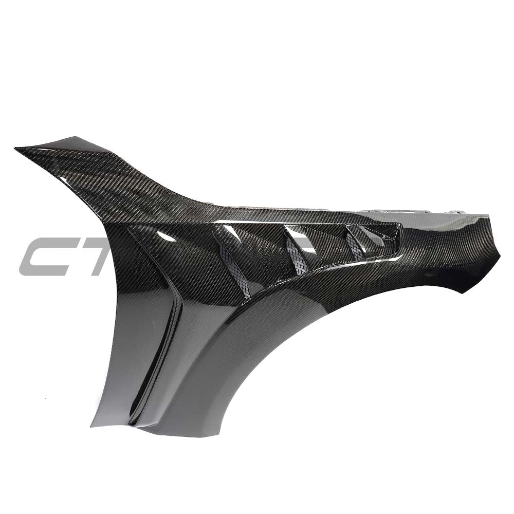 BMW G87 M2 full carbon fibre bonnet and wing fender kit installed on the front end, showcasing lightweight, high-performance CT Carbon parts.