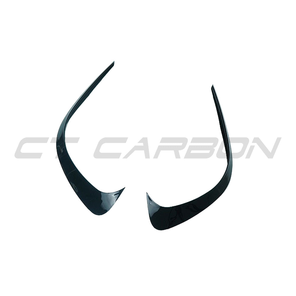 Mercedes W206 2021+ C-Class CT Carbon gloss black front bumper corner trim splitter, close-up view of the sleek car accessory.