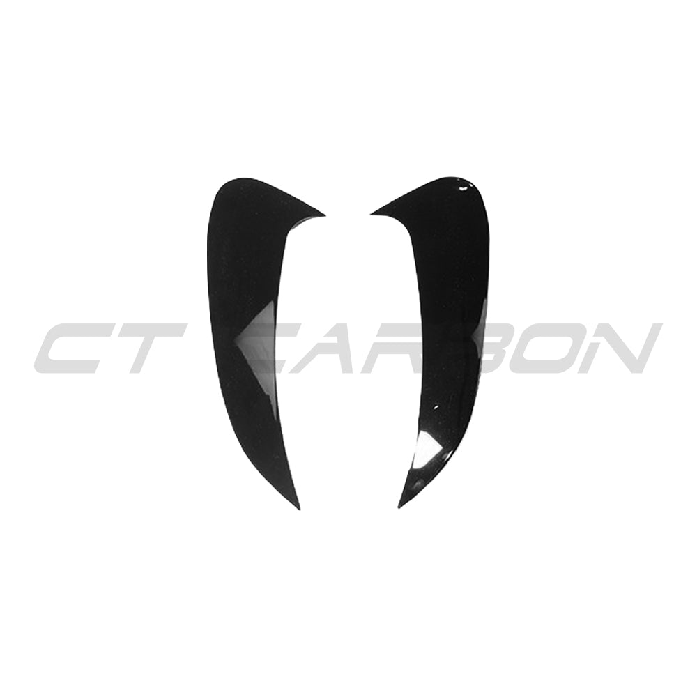 Mercedes W206 2021+ C-Class gloss black rear bumper trim bumper corners by CT Carbon, close-up view of sleek black finish.