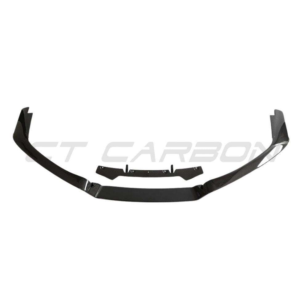 Porsche 911 992 Carrera carbon fibre splitter V2 by CT Carbon, showing the aerodynamic design and textured carbon fiber surface.