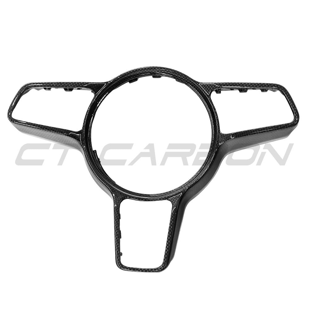 CT Carbon steering wheel trim for Porsche 911, Cayman, Boxster, Cayenne, and Macan models from 2013+ with a sleek finish.