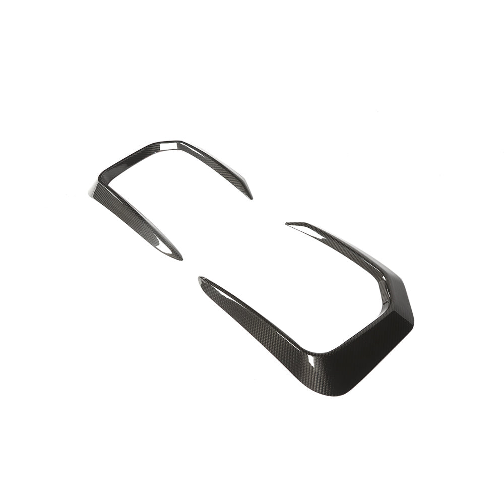 Range Rover L460 2022+ carbon fiber front bumper trim by CT Design, close-up of sleek, textured carbon fiber accessory.
