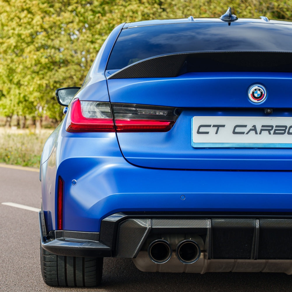 BMW G80 M3 and G20 3 Series carbon fibre spoiler by CT Carbon, featuring a sleek, aerodynamic design with a matte finish.