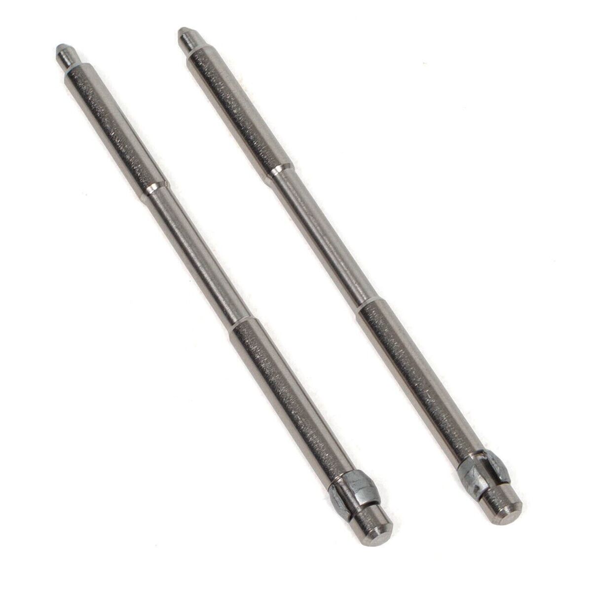 Genuine BMW rear caliper guide pin set, part 34216857152, with metal pins and rubber bushings for proper brake caliper alignment.
