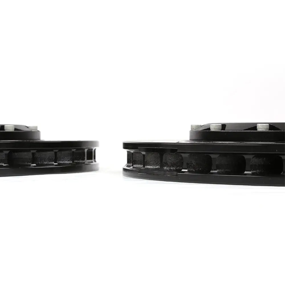 Yellow Speed Racing grooved two-piece brake disc detail for BMW F8X AP Racing front brake package